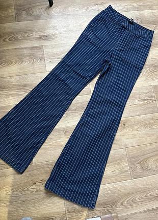 Джинси жіночі кльош