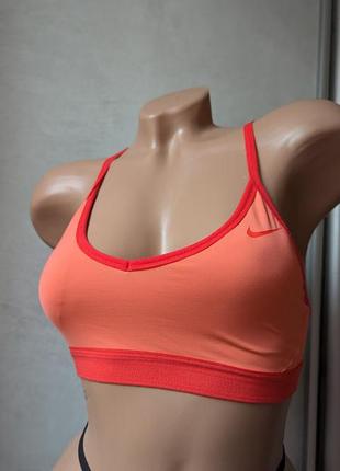 Спортивний кораловий   топ nike pro indy bra