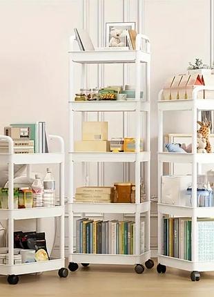 Чотирьох ярусна етажерка на коліщатках.