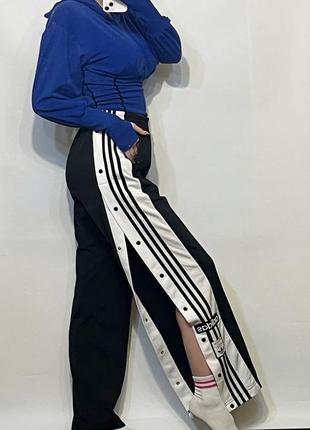 Брюки адидас брюки адибрейк adibreak adidas price оригинальные новые с биркой с манжетами на застежках кнопках с лого4 фото