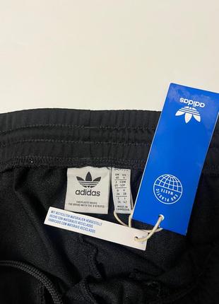 Брюки адидас брюки адибрейк adibreak adidas price оригинальные новые с биркой с манжетами на застежках кнопках с лого6 фото