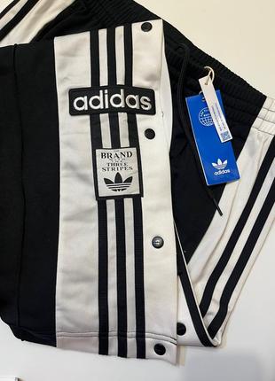 Штани адідас брюки адібрейк adibreak adidas оригінальні нові з біркою з манжетами на застібках кнопках з лого