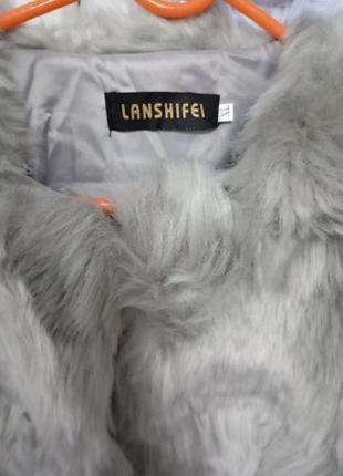 Жіноча шубка