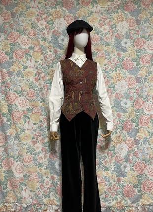 Стеганая жилетка