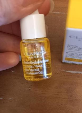 Масло для лица для обезвоженной кожи clarins blue orchid face treatment oil, 5 мл