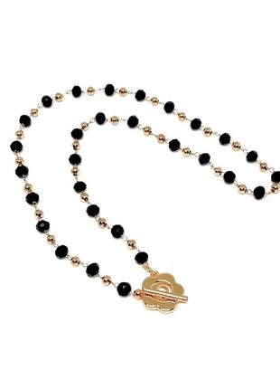Стильний золотистий жіночий чокер кольє підвіс чорні намистини кулон квітка