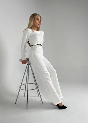 Костюм штани та топ з бахромою, та з камінням