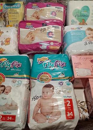 Підгузки різні, лактаційні вкладки для грудей
