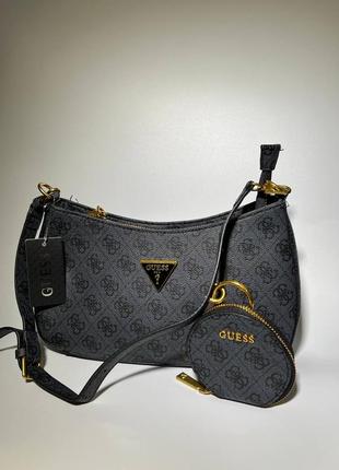 Маленька сумочка із колекції guess.
