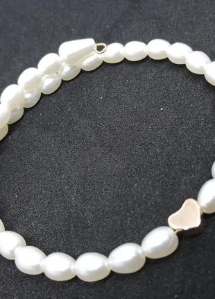 Браслет універсольного розміру з сердечком.