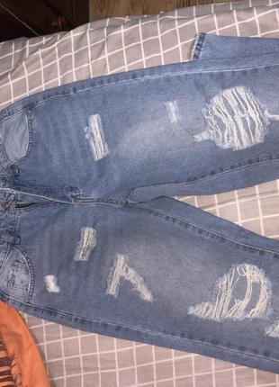Нові рвані джинси