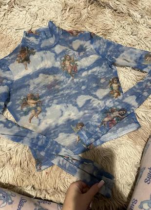 Сетка с ангелишками водолазка