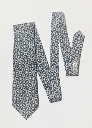 Люксовый, винтажный, шелковый галстук gucci 1970s