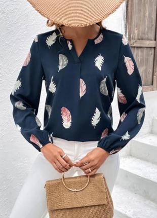 Блузочка в кольорові пір'їнки