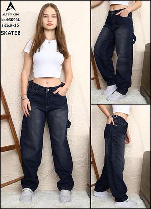 Широкі джинси на дівчинку