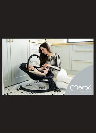 Заколисуючий центр momi