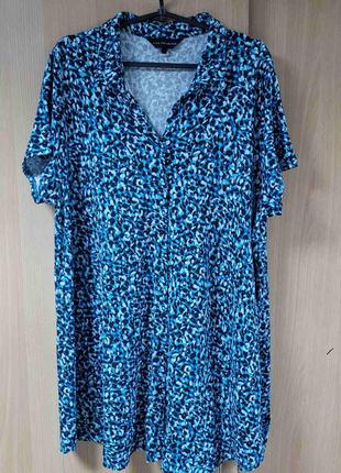 Трикотажная блуза на пуговицах.