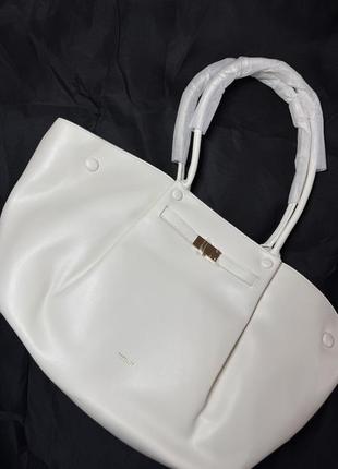 Біла сумочка демілер