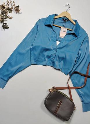 Блакитна сатінова блуза