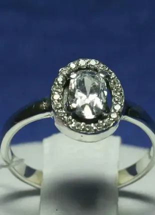 Срібна каблучка з фіанітами овал 11094