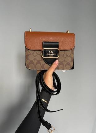 Женская коричневая сумка из натуральной кожи coach
