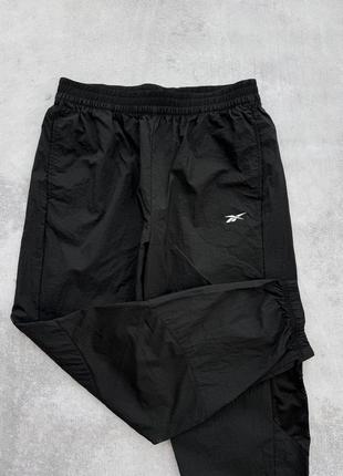 Нейлоновые брюки тонкие с сеткой reebok черные спортивные