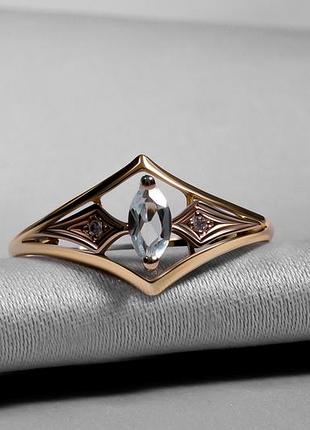 Кольцо из красного золота с топазом и бриллиантами
