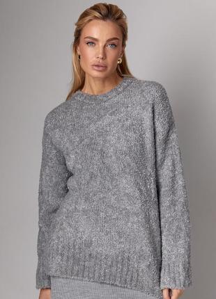 Жіночий подовжений в'язаний джемпер oversize