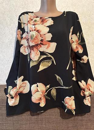 Блузон с воланами на рукаве