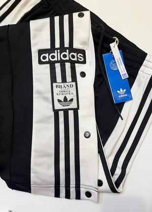 Штани адідас брюки адібрейк adibreak adidas оригінальні нові з біркою з манжетами на застібках кнопках з лого