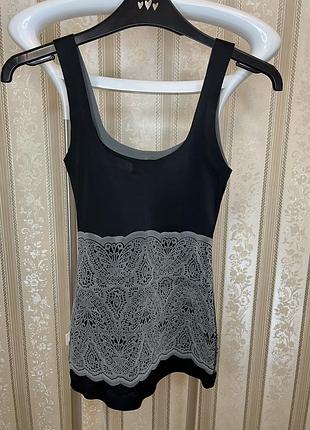 Стягуюча майка triumph