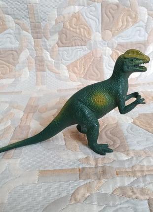 Динозавр іграшка