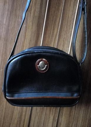 Кожаная сумка кроссбоди.