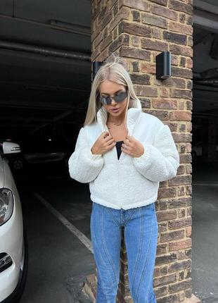 Тепла куртка тедді на блискавці з манжетами на резинуі на рукавах з кулискою з низу куртки