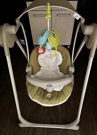 Дитяча гойдалка шезлонг,електричні є 4 режими+пульт+вібро+столик для годування.має 2 положення,дуже гарний стан.фірма «chiссо»