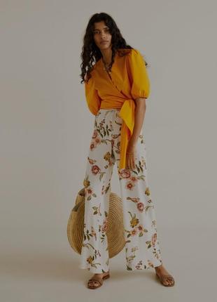 Широкие брюки из тележки mango