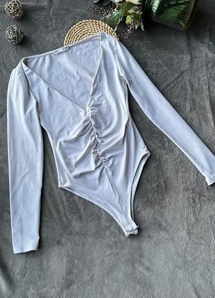 Безшовний боді з драпіруванням з рукавом