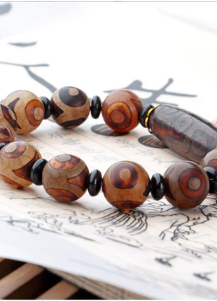Браслет коричнева дзі 9 очей і десять на 3 ока