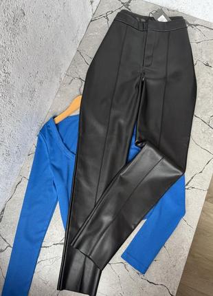 Кожаные брюки, леггинсы