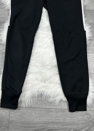 Женские оригинальные спортивные штаны nike3 фото