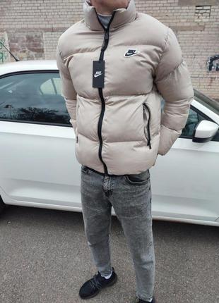 Зимовий пуховик nike бежевий