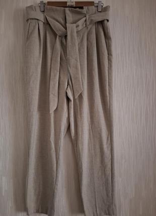 Штани нові теплі 14/42 розміру