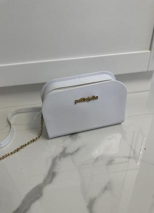 Біла лакова сумка