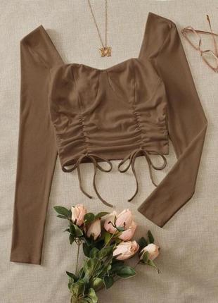 Стильная кофточка в рубчик с завязками