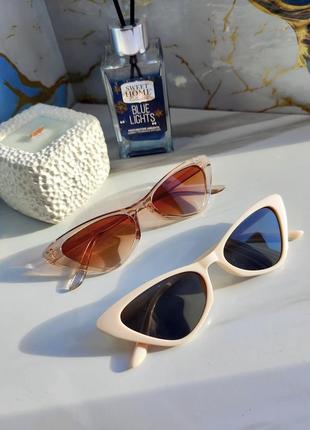 Жіночі сонцезахисні окуляри