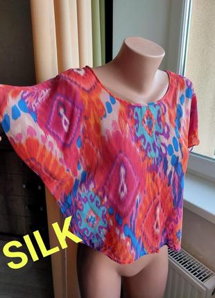 Стильная короткая шелковая блуза летучая мышь