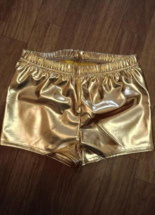 Стильные золотистые шорты для девочки