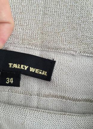 Золотистая трикотажная юбка мини,tally weijl р. xs/s подчеркивает фигуру высокая талия4 фото