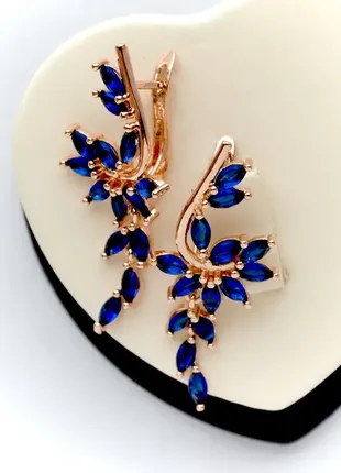 Шикарные серьги с синими кристаллами фирма fallon (медицинское золото)