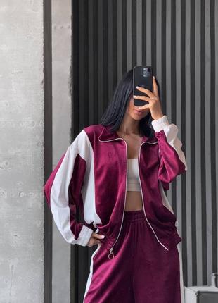 Велюровый комбинированный спортивный костюм с кофтой на молнии с манжетами со свободными брюками с карманами2 фото